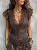 Blusa vintage de Tencel con escote en V y ribete de encaje